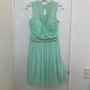Worn once as a bridesmaid. Cute mint color.